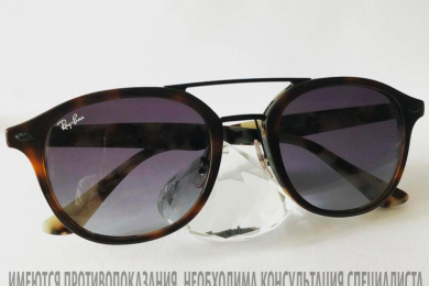 Солнцезащитные очки в салоне "Элит Оптика"